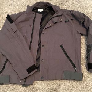 Men’s size XL jacket. Bought at a boutique. Paid $75. Never worn.